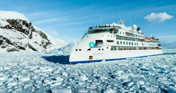 ANTARCTICA_BOAT_CRUISES_SLIDER_IMAGE_the-Greg-Mortimer-in-Antarctica-Tyson-Mayr