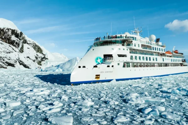 ANTARCTICA_BOAT_CRUISES_SLIDER_IMAGE_the-Greg-Mortimer-in-Antarctica-Tyson-Mayr