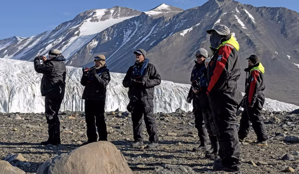 SCENIC ECLIPSE passengers on shore glacier