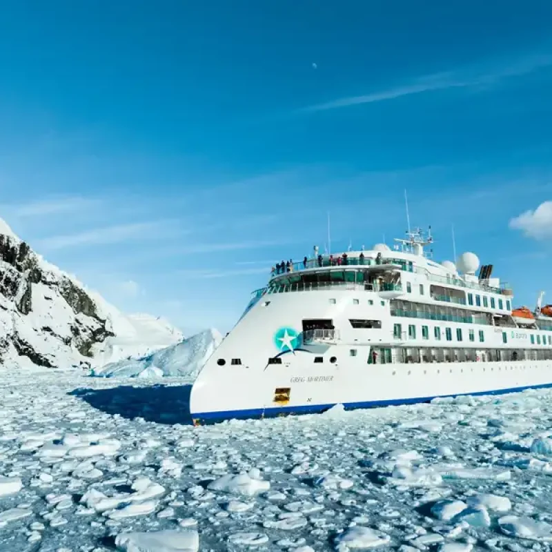 The-Greg-Mortimer-in-Antarctica-ice The-Greg-Mortimer-in-Antarctica-ice