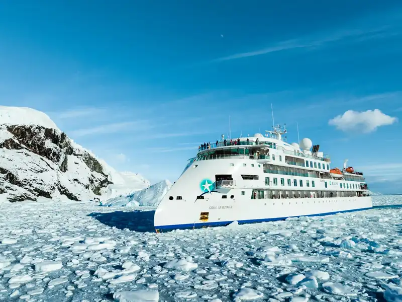 The-Greg-Mortimer-in-Antarctica-ice The-Greg-Mortimer-in-Antarctica-ice